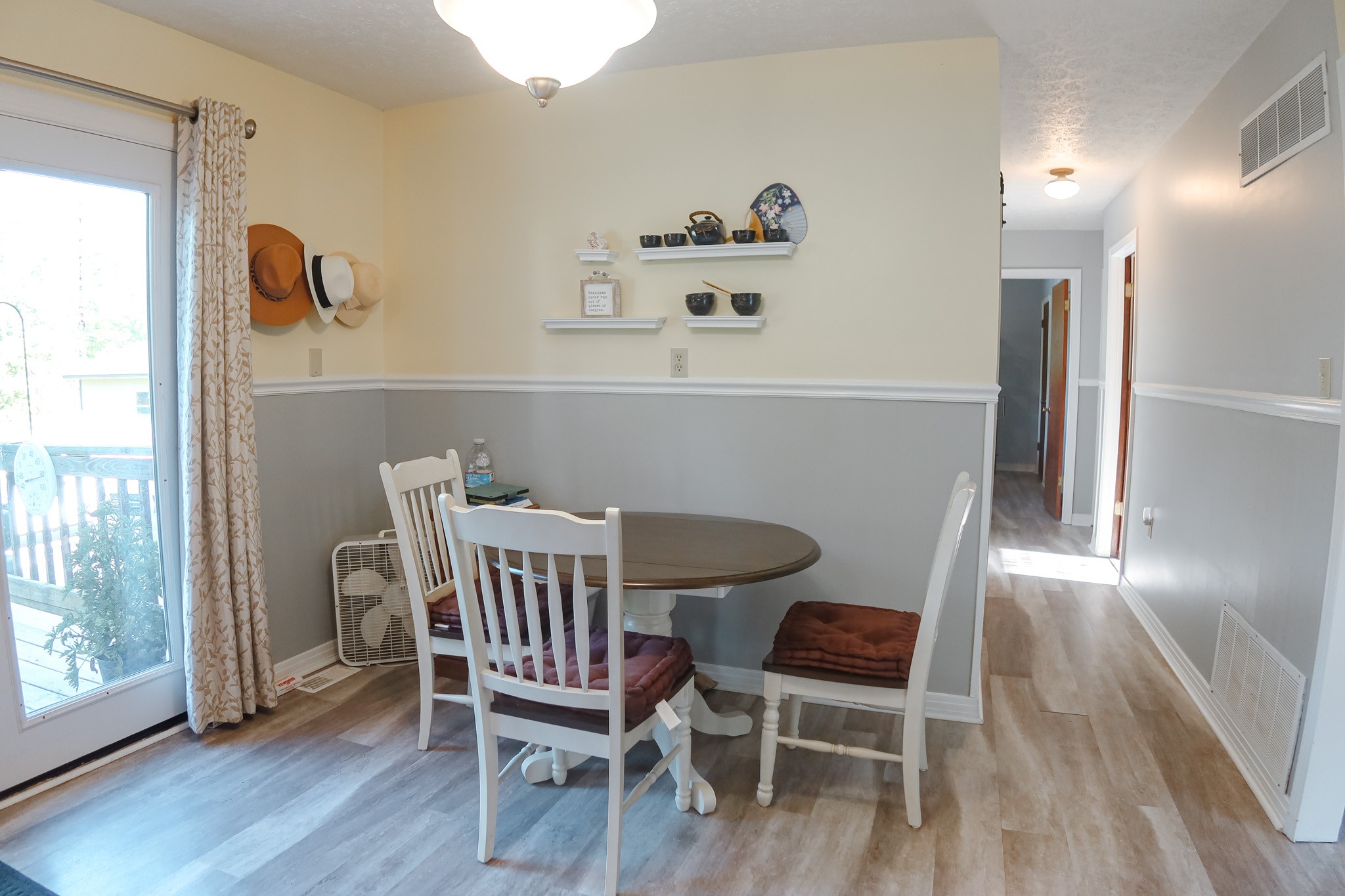 305 Highway 49 Tennessee Ridge, TN 37178 - Photo 10 of 32 a view of a dining room with furniture large window and wooden floor