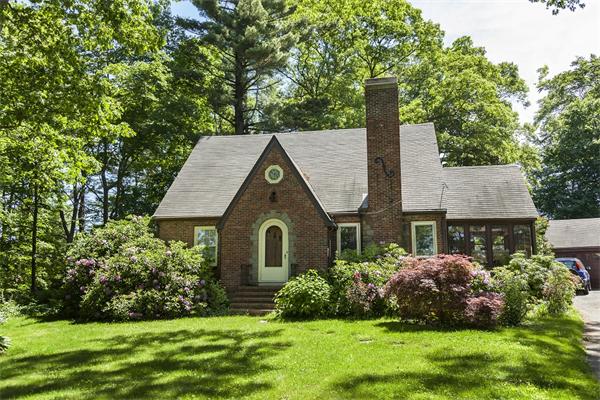 29 Pine Knoll Road Lexington, MA 02420 - Photo 1 of 14 a front view of a house with a yard and garage