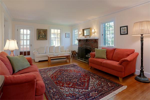29 Pine Knoll Road Lexington, MA 02420 - Photo 3 of 14 a living room with furniture or couch and a fireplace