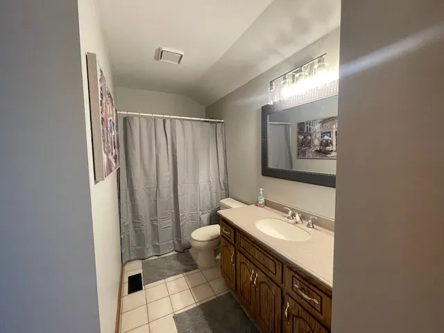 a front view of a house with a garage