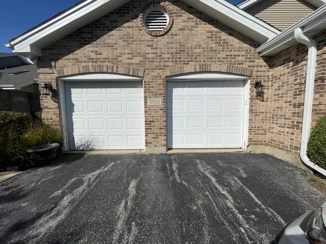 a view of a backyard with furniture and a fire pit