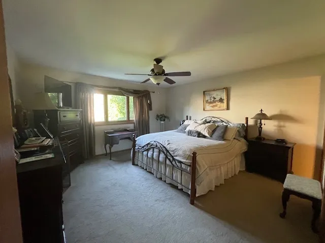 a bathroom with a sink vanity granite and a mirror