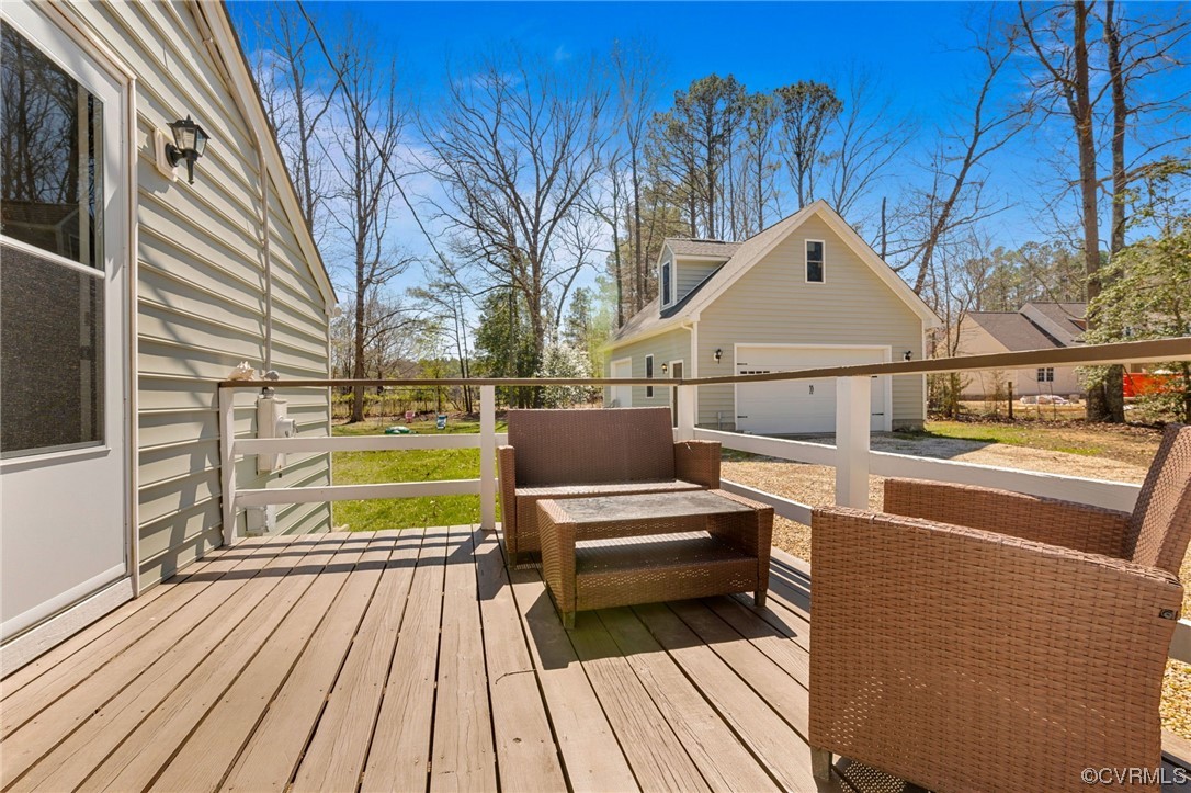 10241 Reedy Branch Road Chesterfield, VA 23838 - Photo 5 of 26 a view of roof deck with wooden floor and seating space