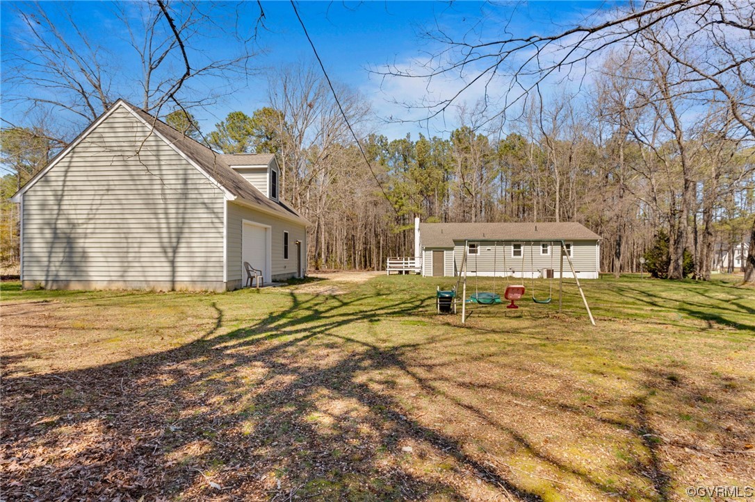 10241 Reedy Branch Road Chesterfield, VA 23838 - Photo 6 of 26 a view of a house with pool and sitting area
