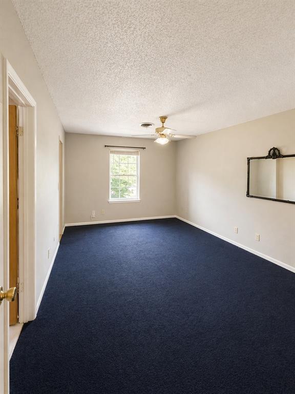 504 Aspen Road Gainesville, TX 76240 - Photo 5 of 11 an empty room with windows