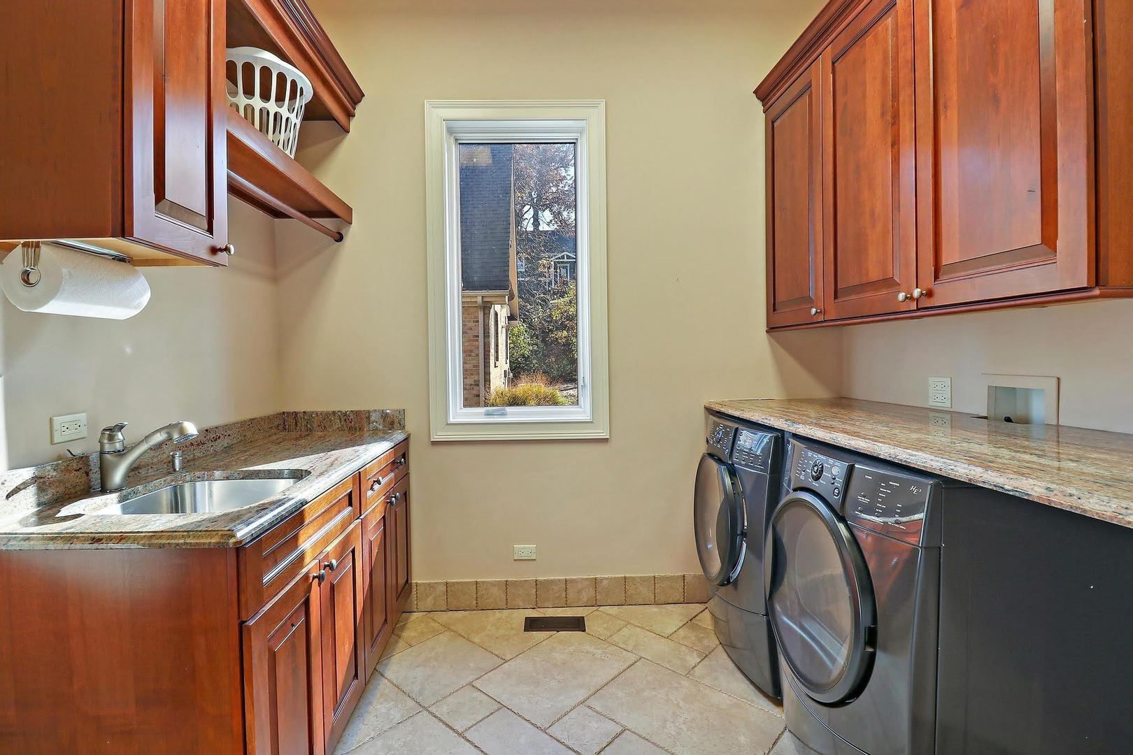 1004 Pistakee View Drive Johnsburg, IL 60051 - Photo 21 of 74 a utility room with a sink washer and dryer