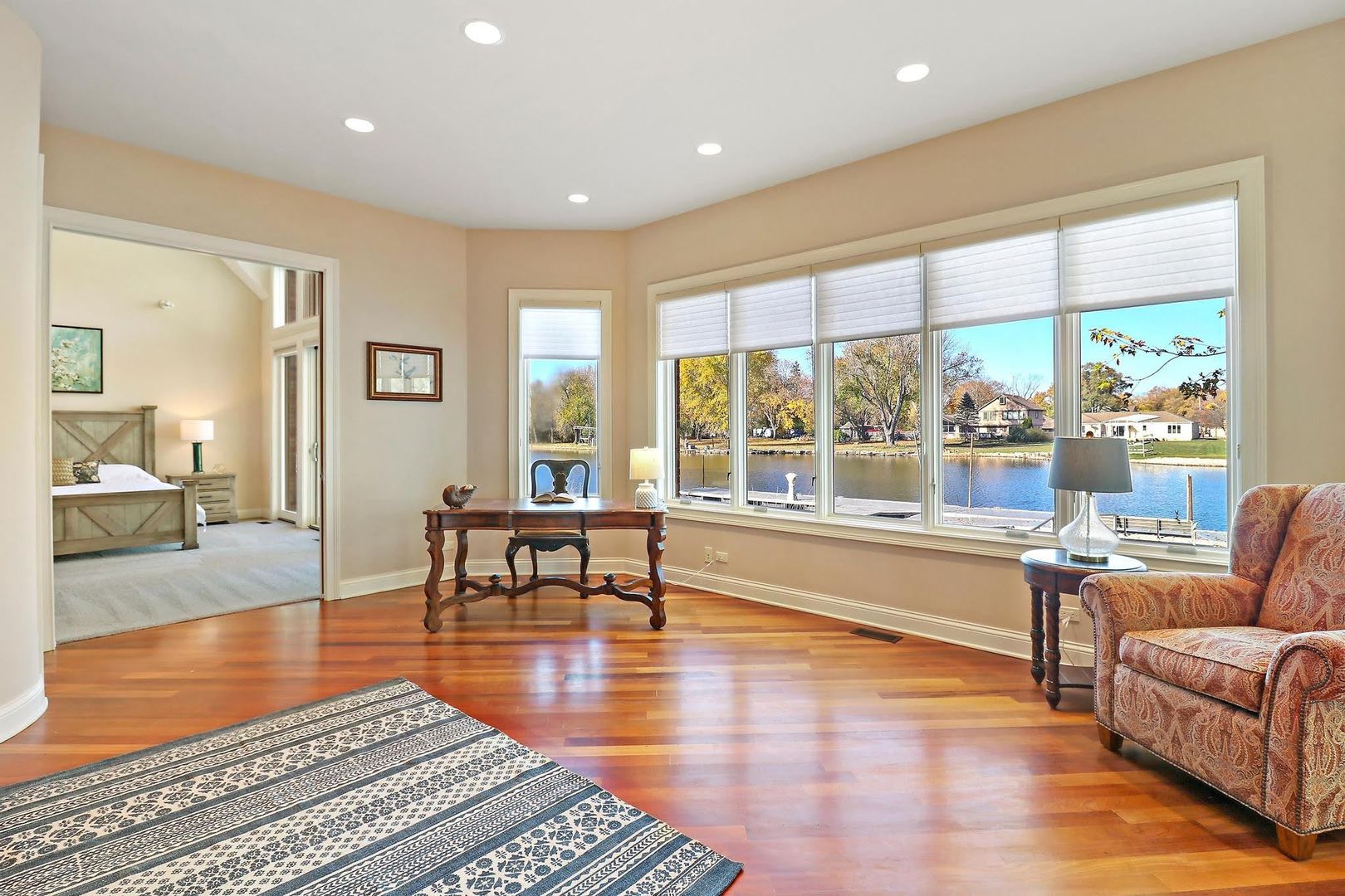 1004 Pistakee View Drive Johnsburg, IL 60051 - Photo 23 of 74 a living room with furniture and a large window