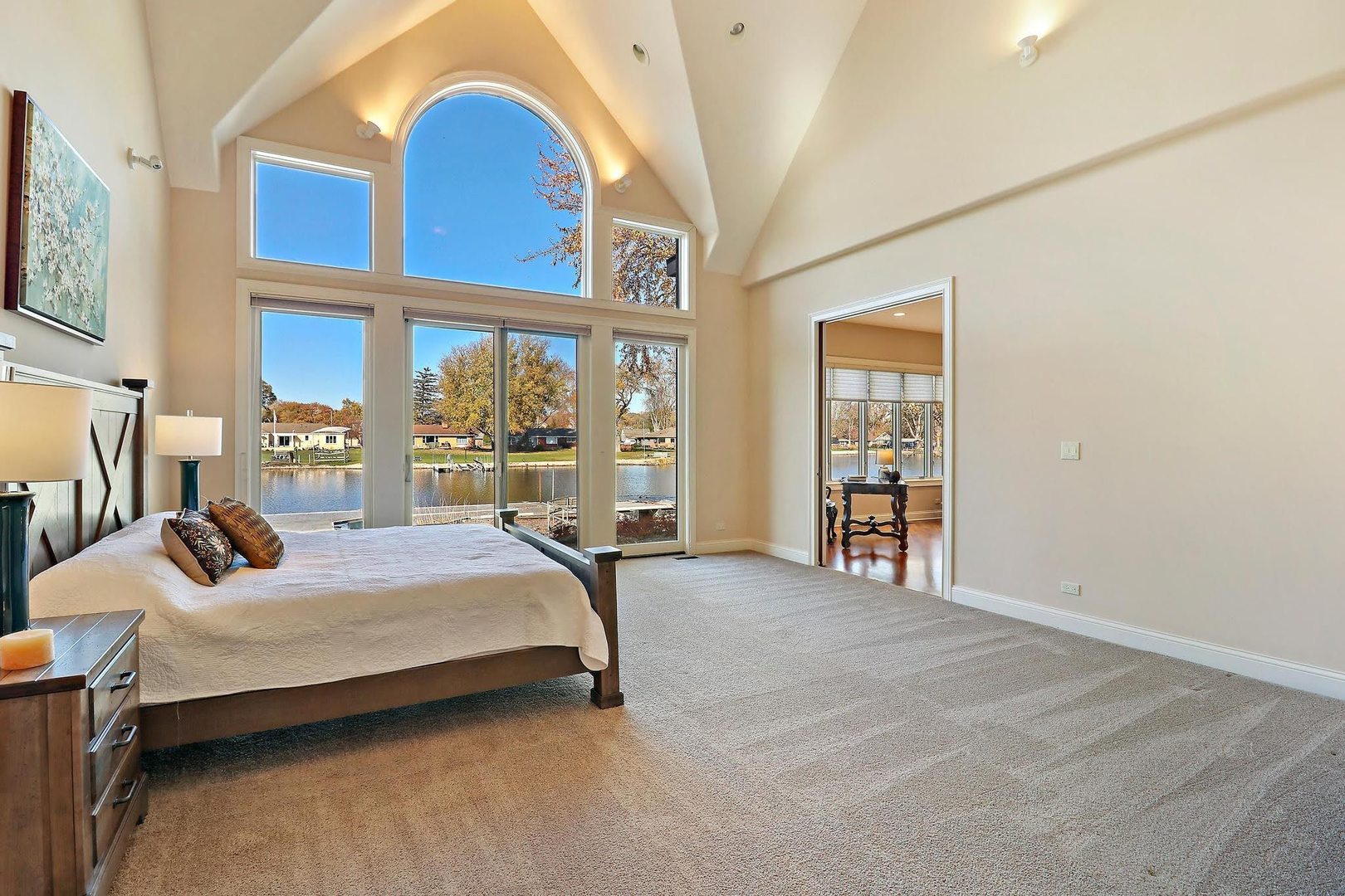 1004 Pistakee View Drive Johnsburg, IL 60051 - Photo 25 of 74 a bedroom with a bed and a large window