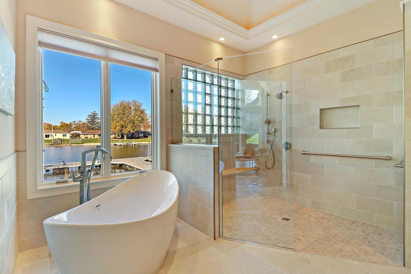1004 Pistakee View Drive Johnsburg, IL 60051 - Photo 28 of 74 a living room with furniture and a floor to ceiling window