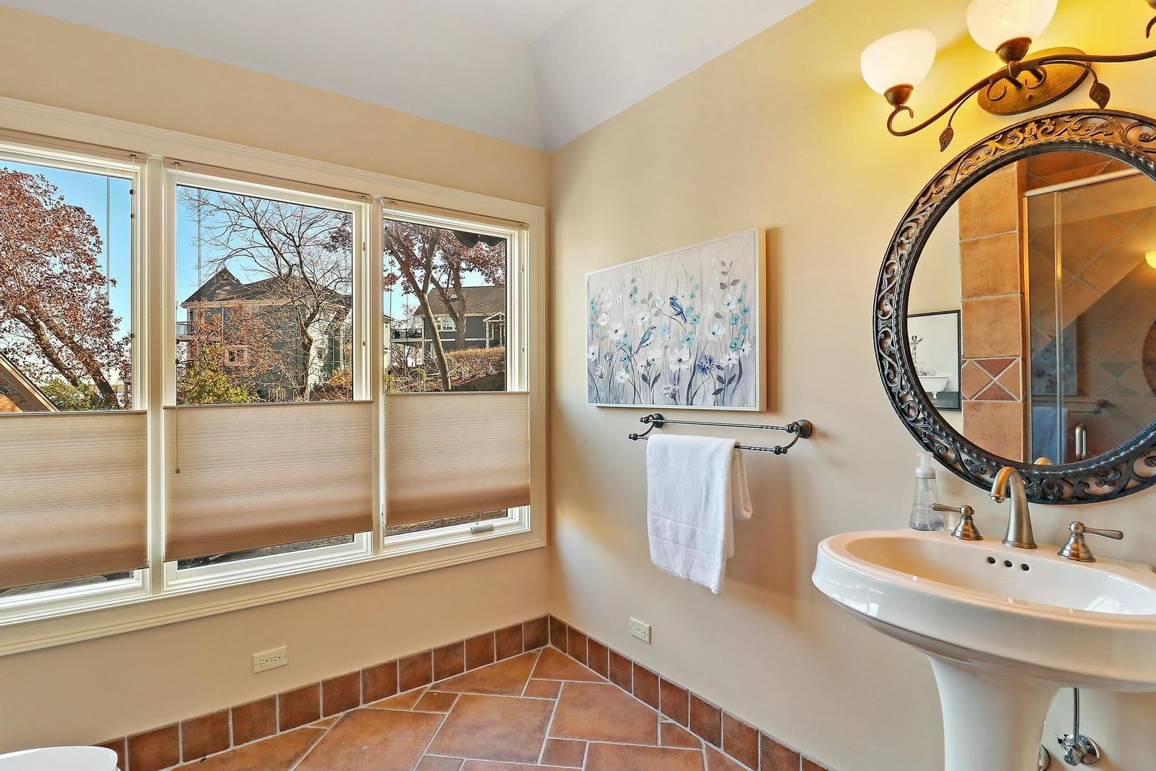 1004 Pistakee View Drive Johnsburg, IL 60051 - Photo 37 of 74 a bathroom with a sink and a mirror