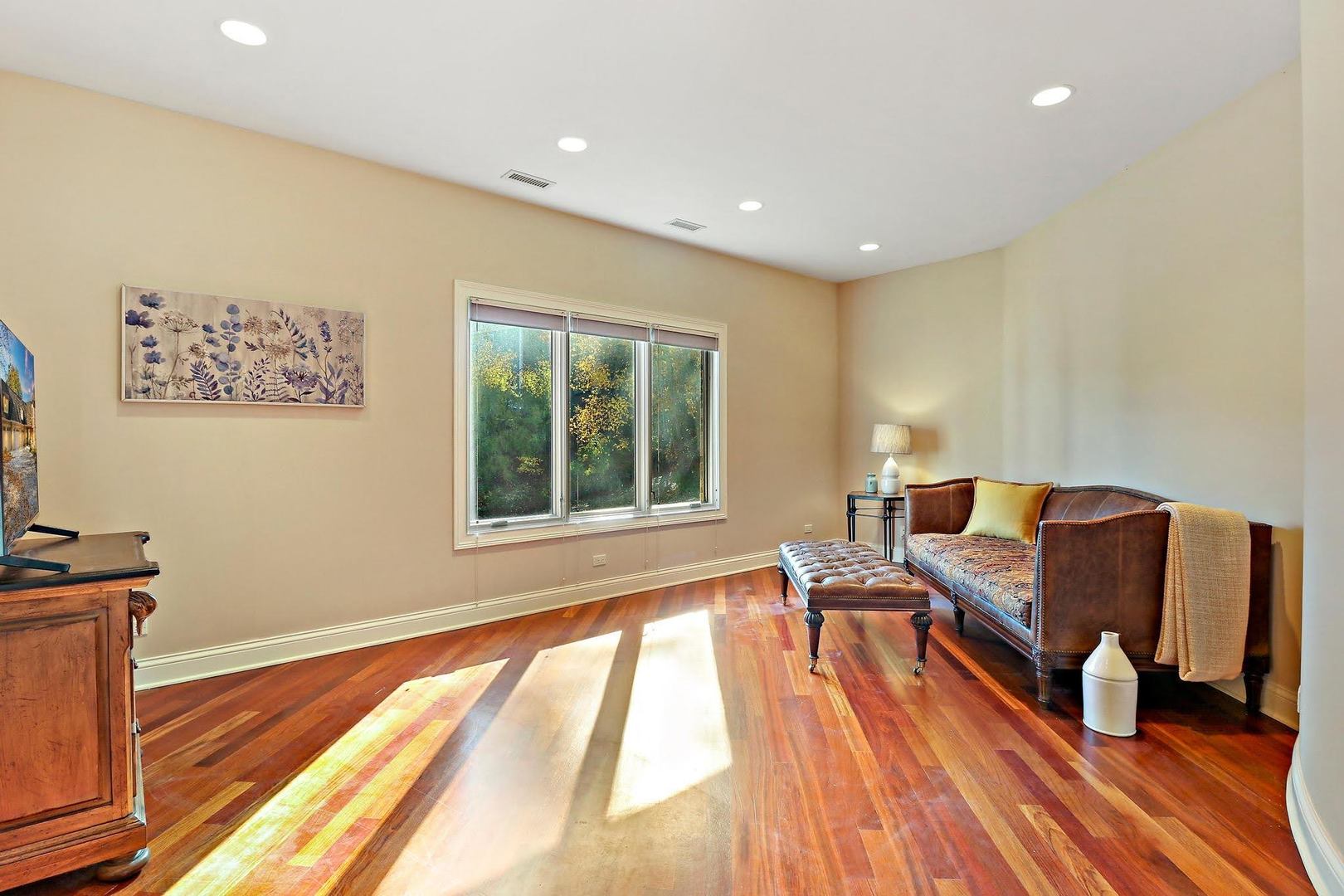 1004 Pistakee View Drive Johnsburg, IL 60051 - Photo 48 of 74 a living room with furniture and a table