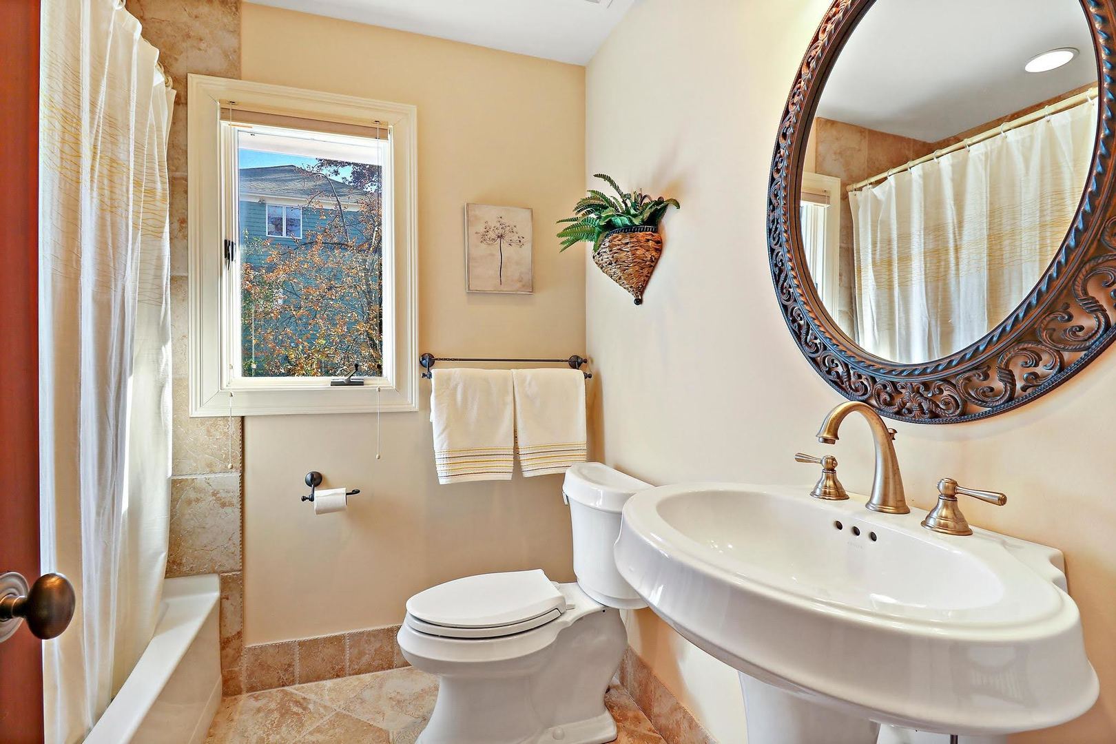 1004 Pistakee View Drive Johnsburg, IL 60051 - Photo 62 of 74 a bathroom with a sink and a mirror