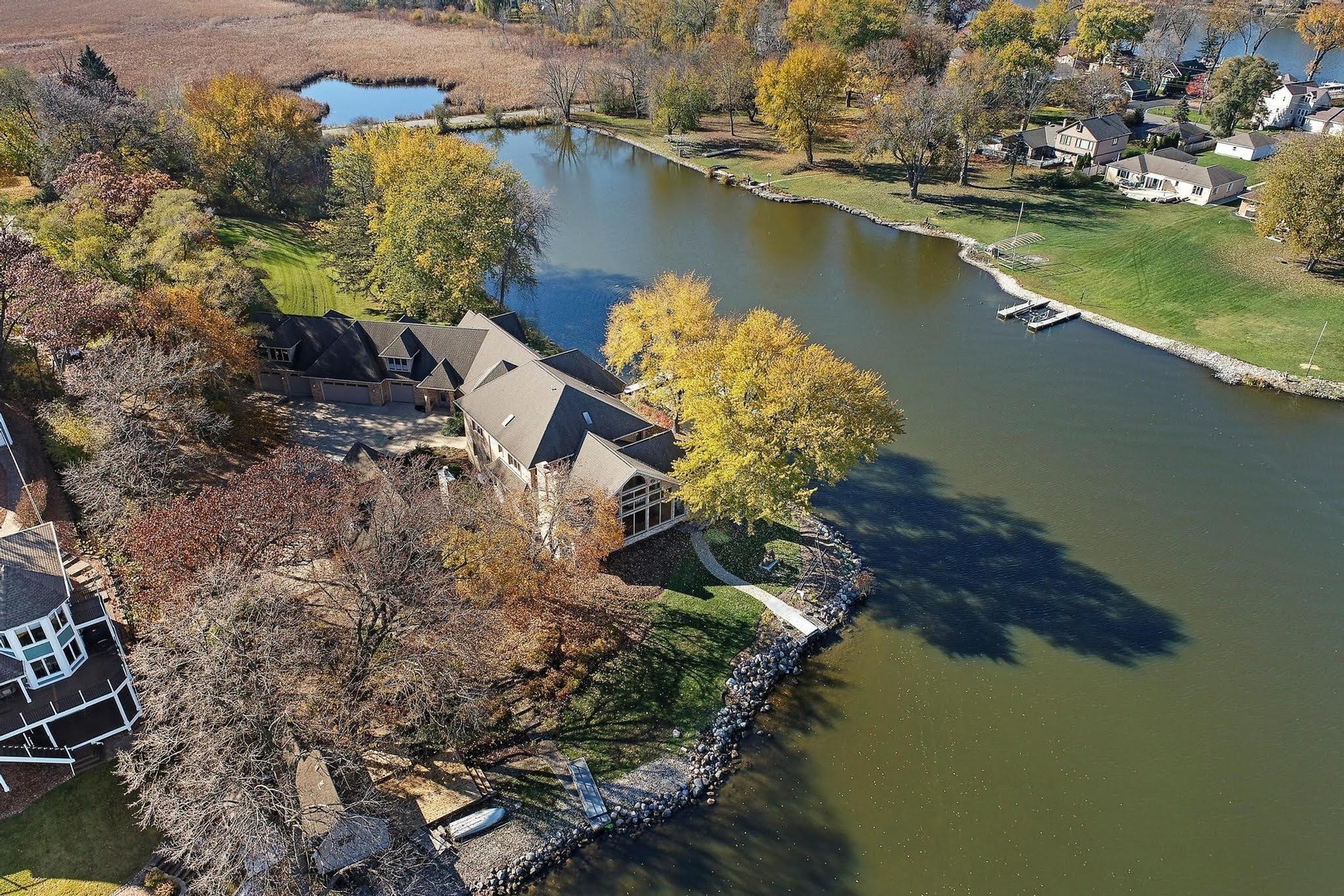 1004 Pistakee View Drive Johnsburg, IL 60051 - Photo 74 of 74 an aerial view of a house with a lake view
