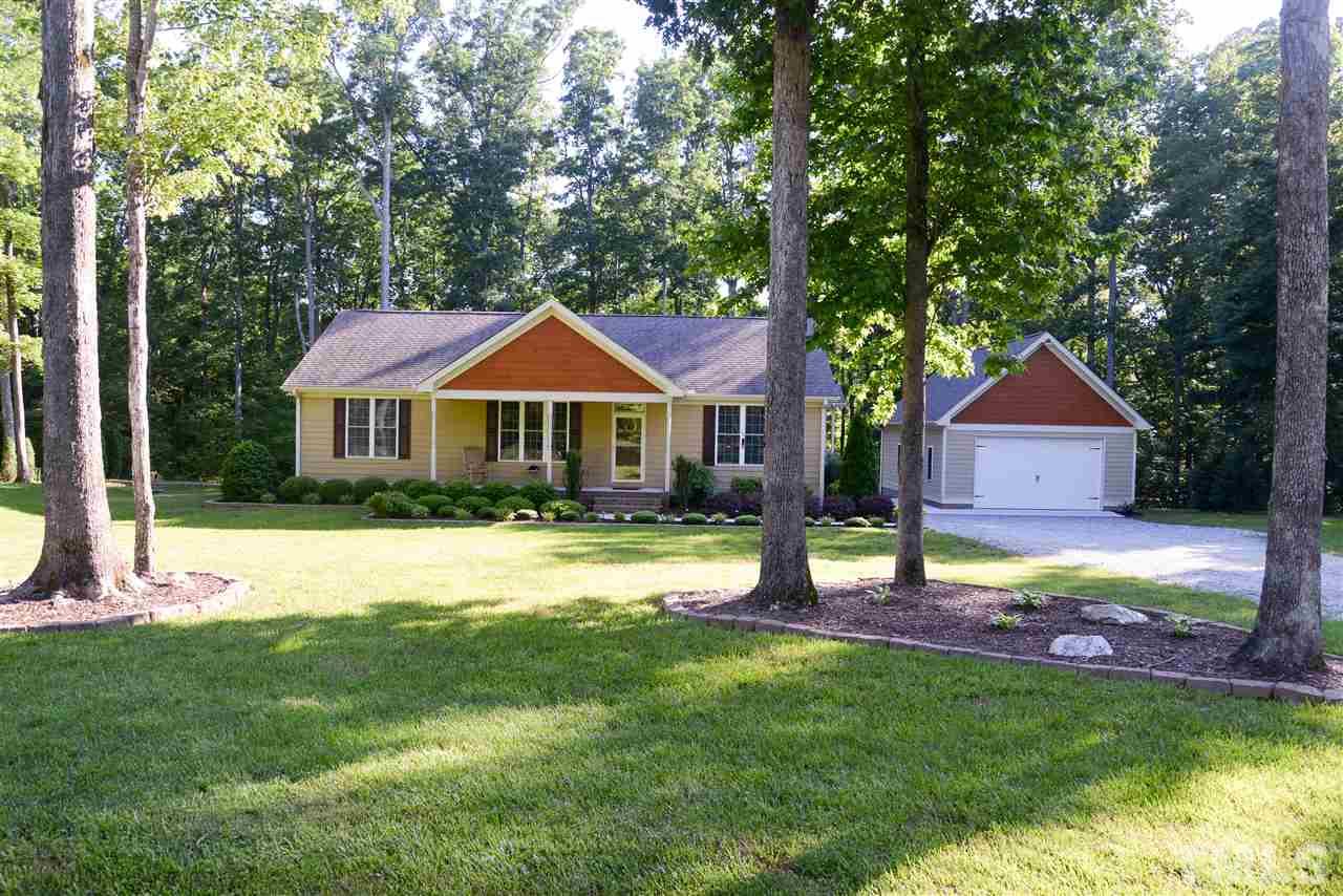 201 Weaver Ridge Road Rougemont, NC 27572 - Photo 2 of 25 a front view of a house with a yard