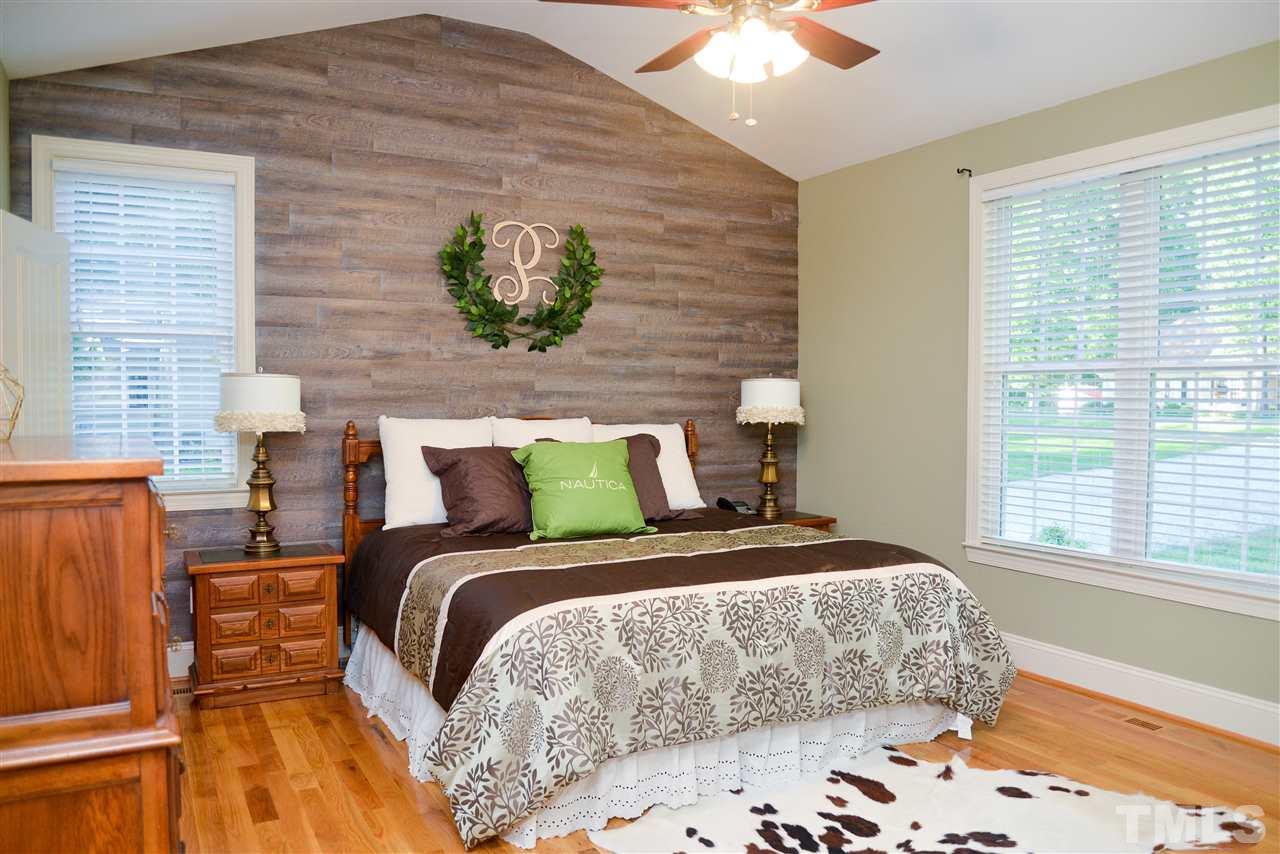 201 Weaver Ridge Road Rougemont, NC 27572 - Photo 14 of 25 a bedroom with a bed and a window