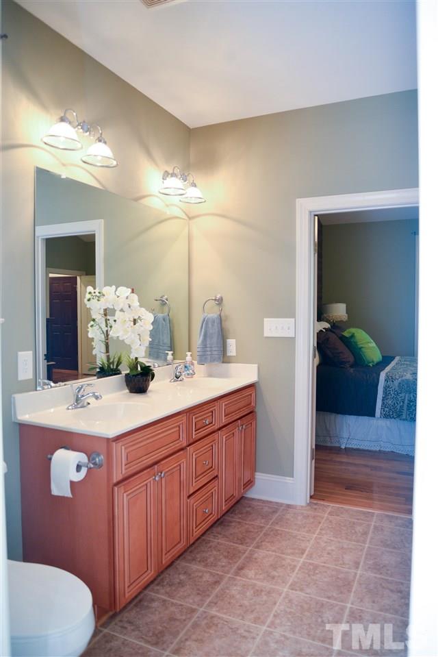 201 Weaver Ridge Road Rougemont, NC 27572 - Photo 16 of 25 a bathroom with a sink and a mirror