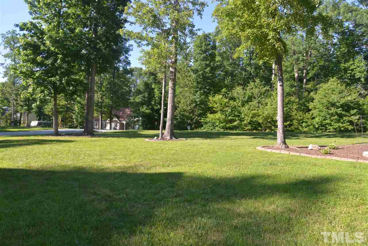 201 Weaver Ridge Road Rougemont, NC 27572 - Photo 5 of 25 a view of outdoor space with garden