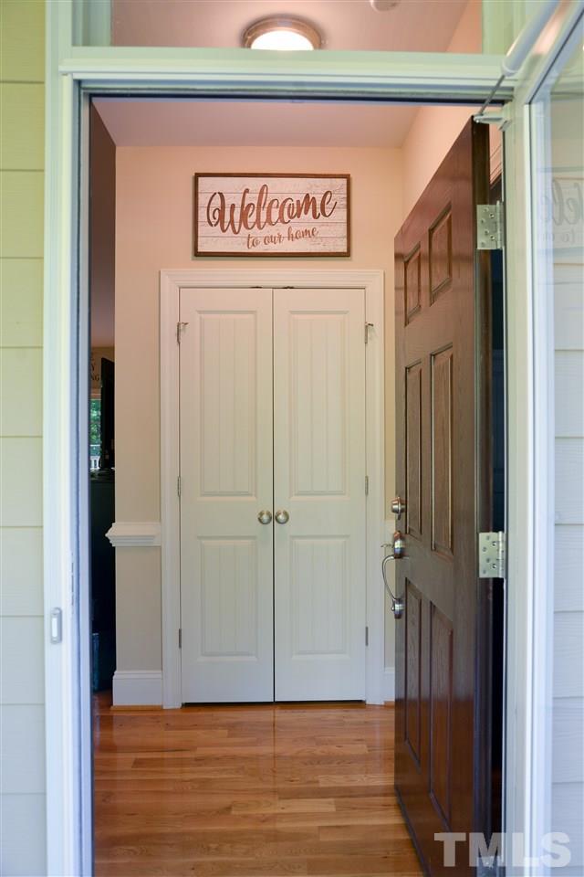 201 Weaver Ridge Road Rougemont, NC 27572 - Photo 6 of 25 a view of a hallway with wooden floor