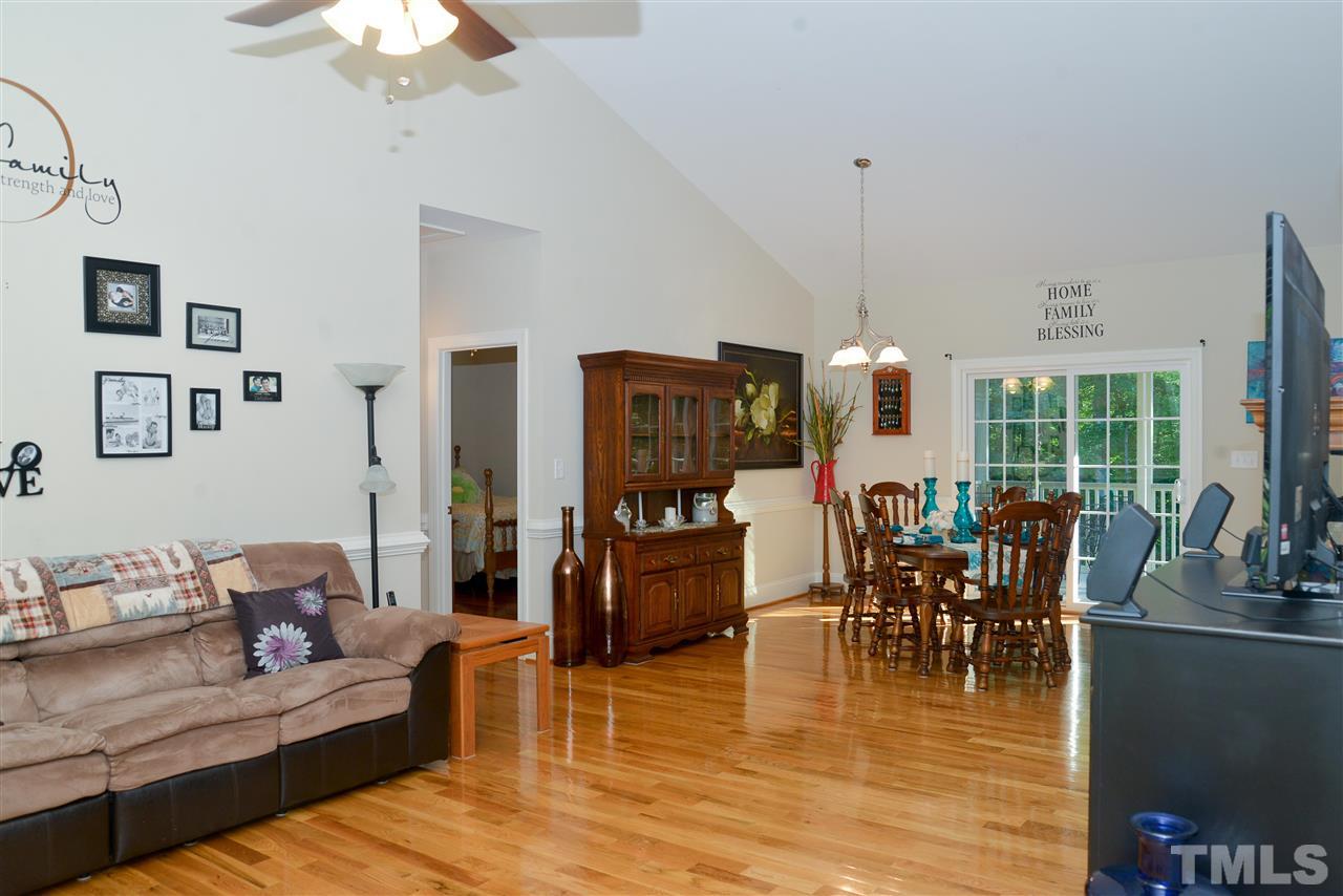 201 Weaver Ridge Road Rougemont, NC 27572 - Photo 8 of 25 a view of a dining room with furniture window and wooden floor