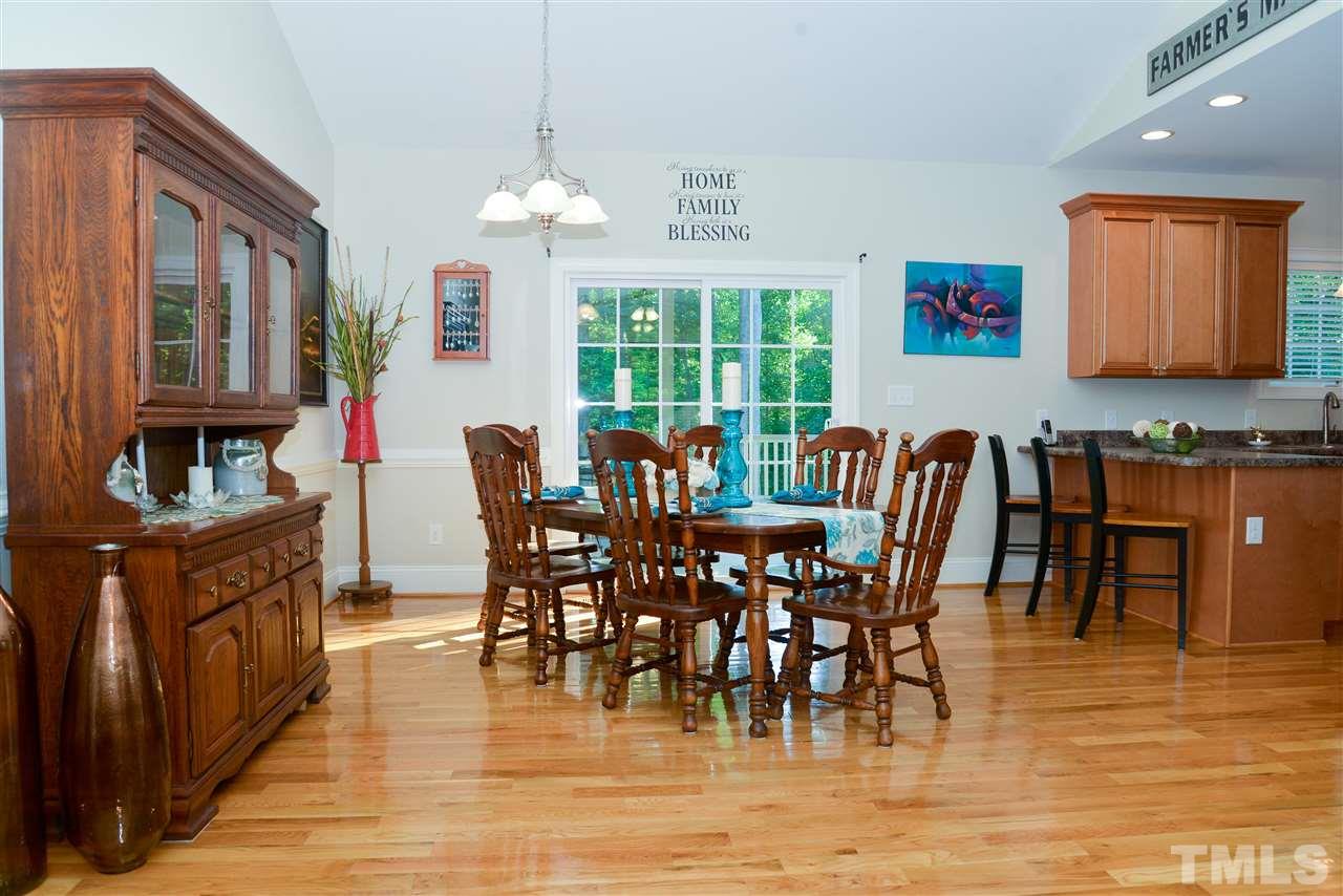 201 Weaver Ridge Road Rougemont, NC 27572 - Photo 9 of 25 a view of a dining room with furniture window and outside view