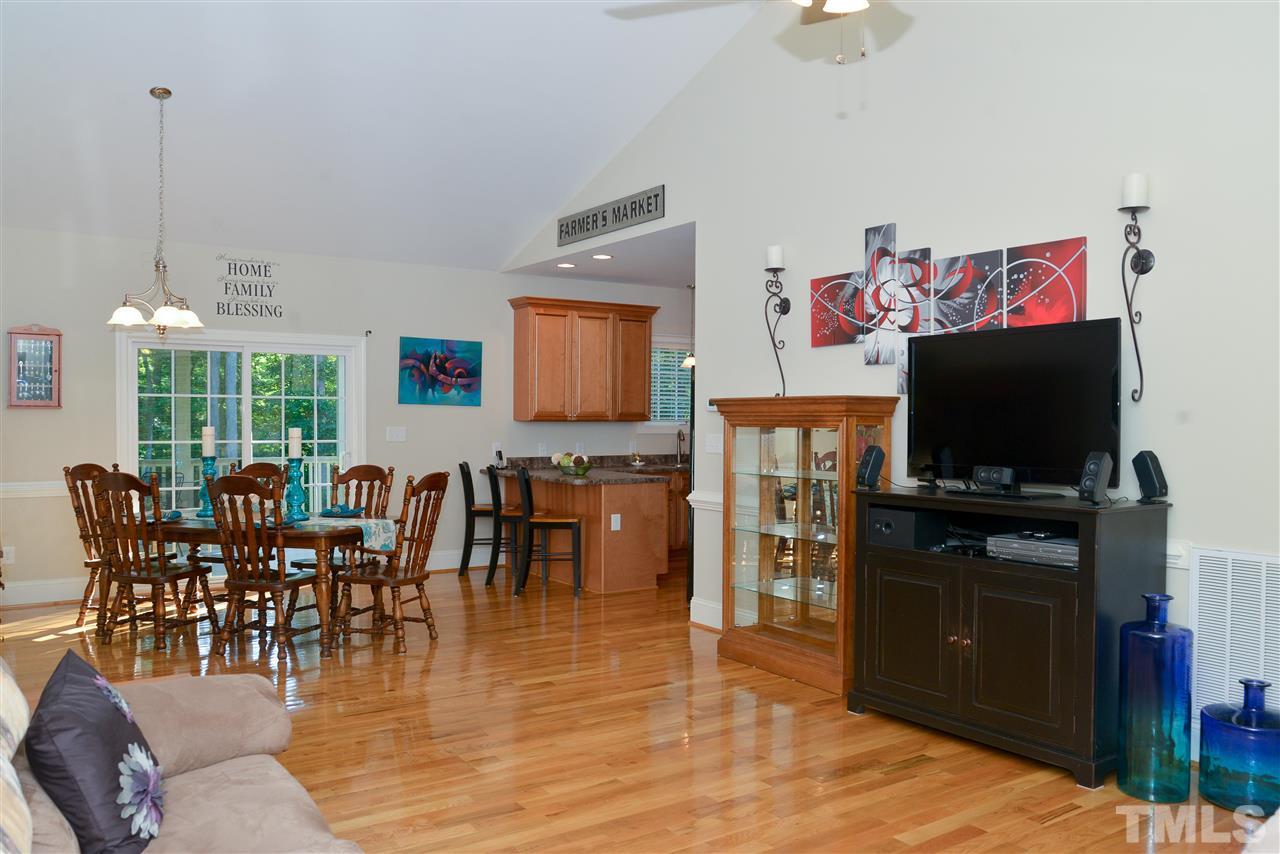 201 Weaver Ridge Road Rougemont, NC 27572 - Photo 10 of 25 a living room with furniture and a flat screen tv