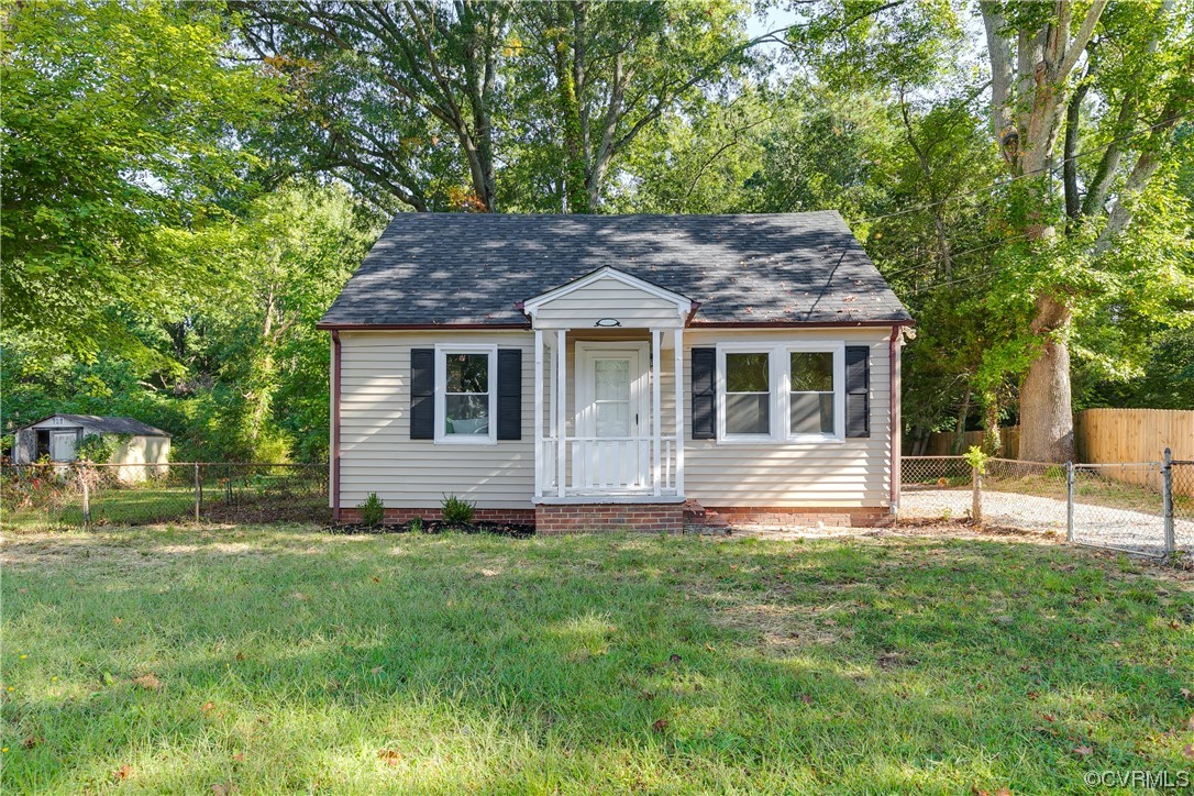5436 Snead Road Richmond, VA 23224 - Photo 2 of 22 a house view with a garden space