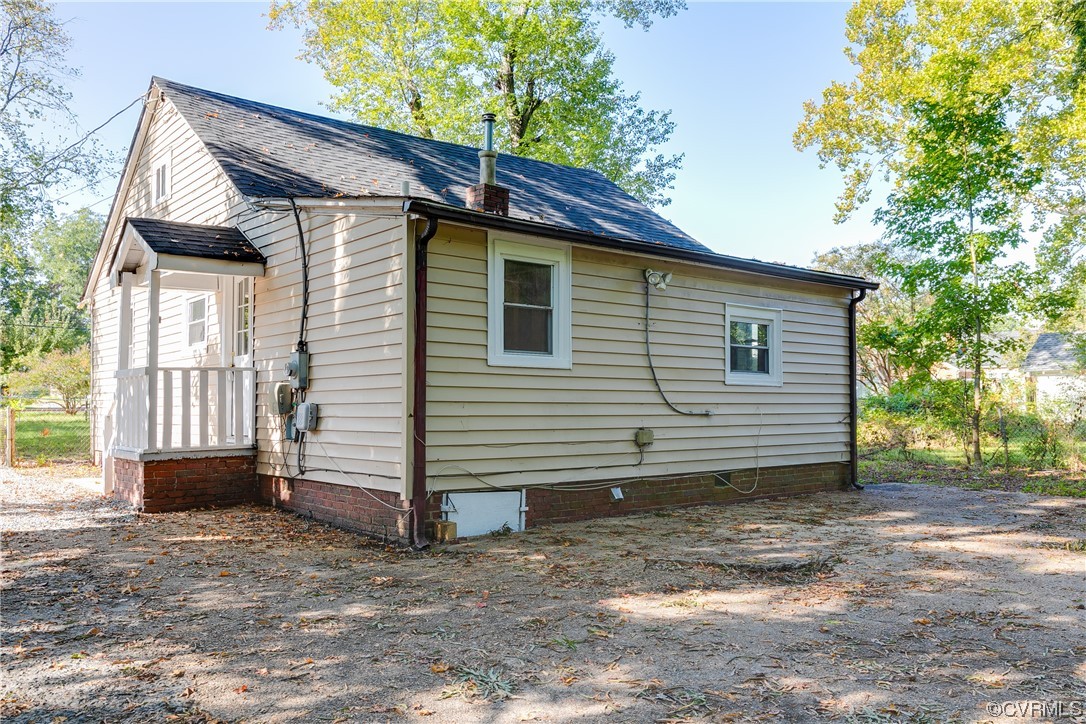 5436 Snead Road Richmond, VA 23224 - Photo 21 of 22 a view of a house with a yard