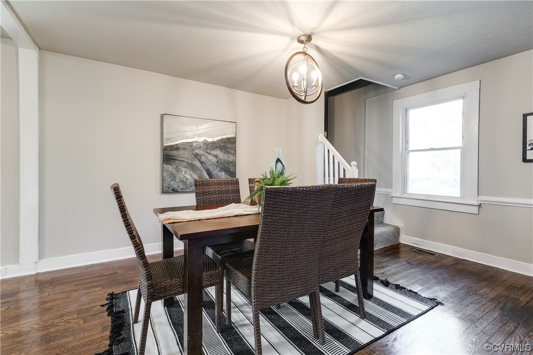 5436 Snead Road Richmond, VA 23224 - Photo 8 of 22 a view of a dining room with furniture window and wooden floor