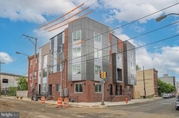 a city street lined with tall buildings