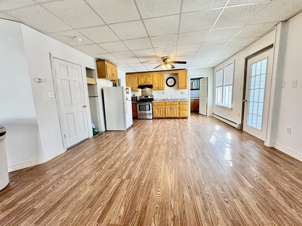 30 Broad Street Fall River, MA 02724 - Photo 5 of 31 a view of a room with wooden floor