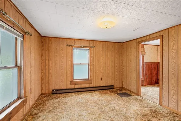 a view of an empty room and window