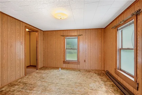 a view of an empty room and window