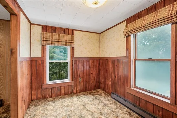 an empty room with windows