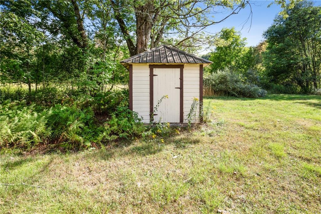 671 Hauger Road Rockwood, PA 15557 - Photo 31 of 39 a front view of a house with a yard