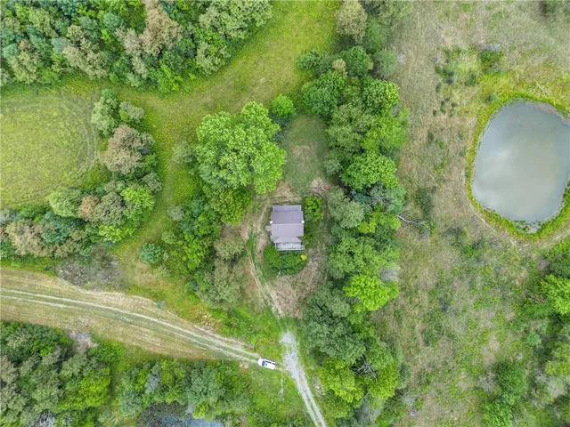 a view of a lake with a yard