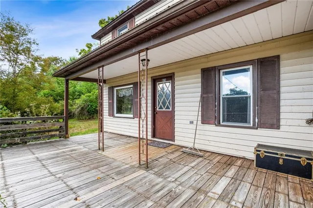 a view of a house with a deck