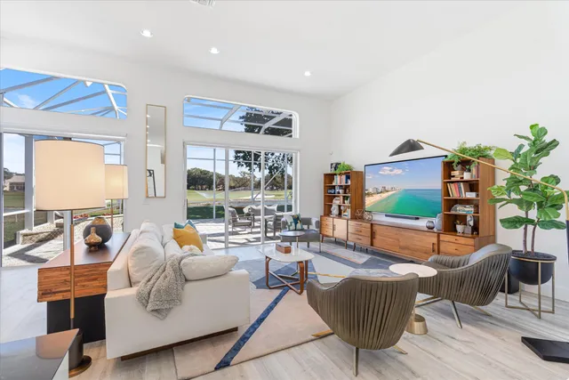 a view of living room with granite countertop furniture and fireplace