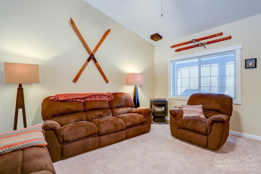 17020 Glendale Road Bend, OR 97707 - Photo 3 of 24 a bedroom with furniture and a window