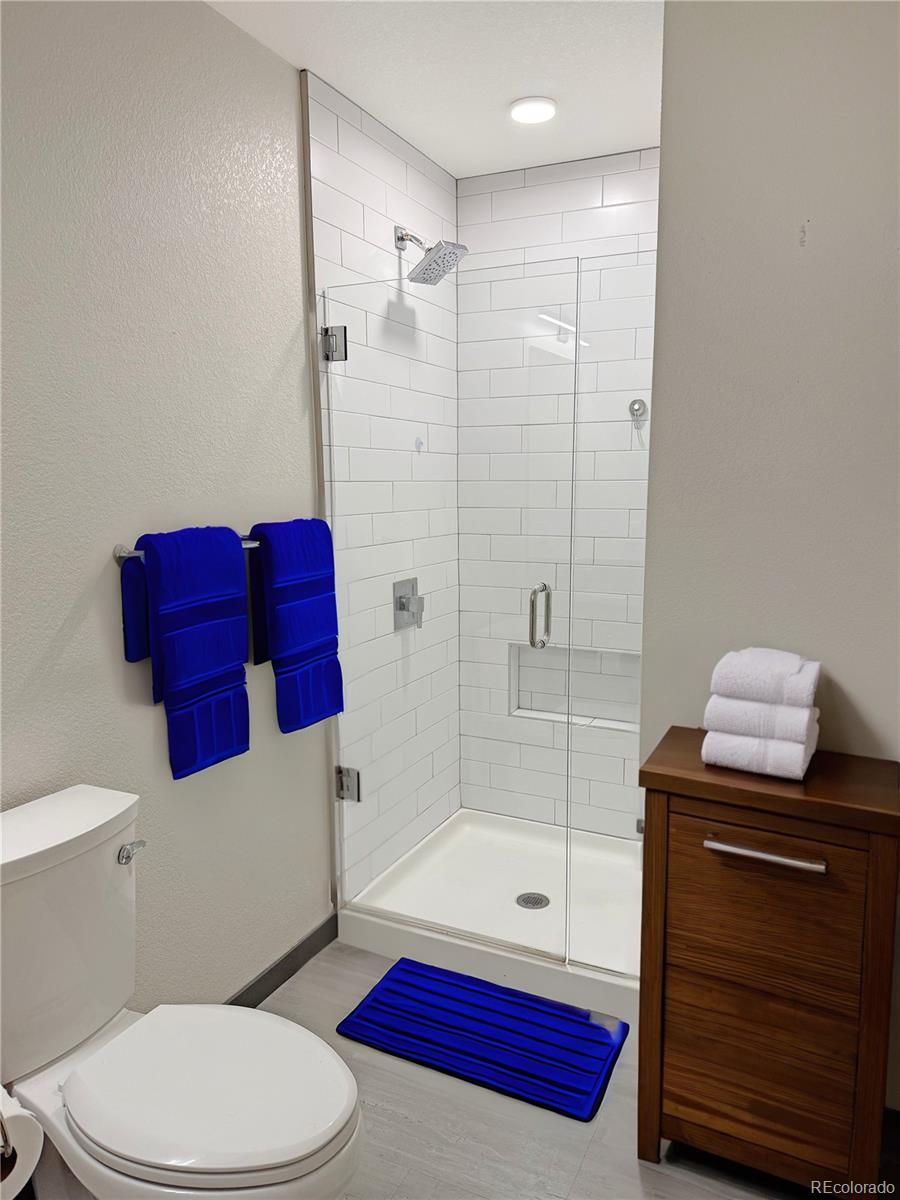 603 Inca Street, Unit 429 Denver, CO 80204 - Photo 12 of 16 a bathroom with a sink and a mirror