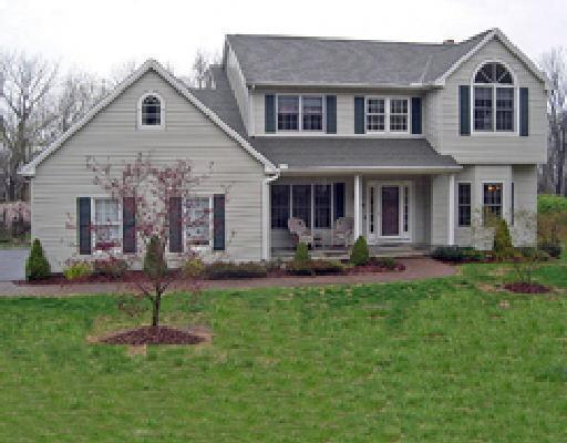 16 Farview Road Brookfield, CT 06804 - Photo 1 of 1 a front view of a house with a yard and garage