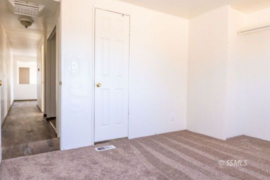 1249 North Charles Street Ridgecrest, CA 93555 - Photo 14 of 21 a view of a room that has a window