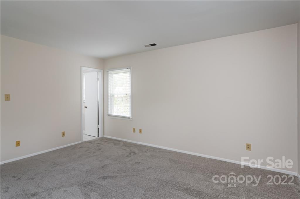 6777 Stoney Ridge Road Matthews, NC 28104 - Photo 18 of 27 a view of an empty room