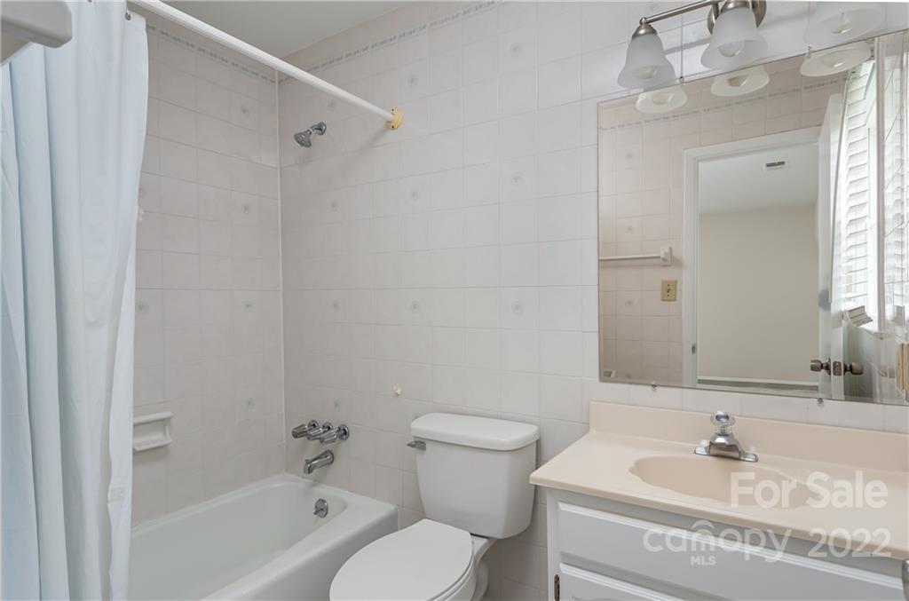 6777 Stoney Ridge Road Matthews, NC 28104 - Photo 19 of 27 a bathroom with a sink a toilet and shower