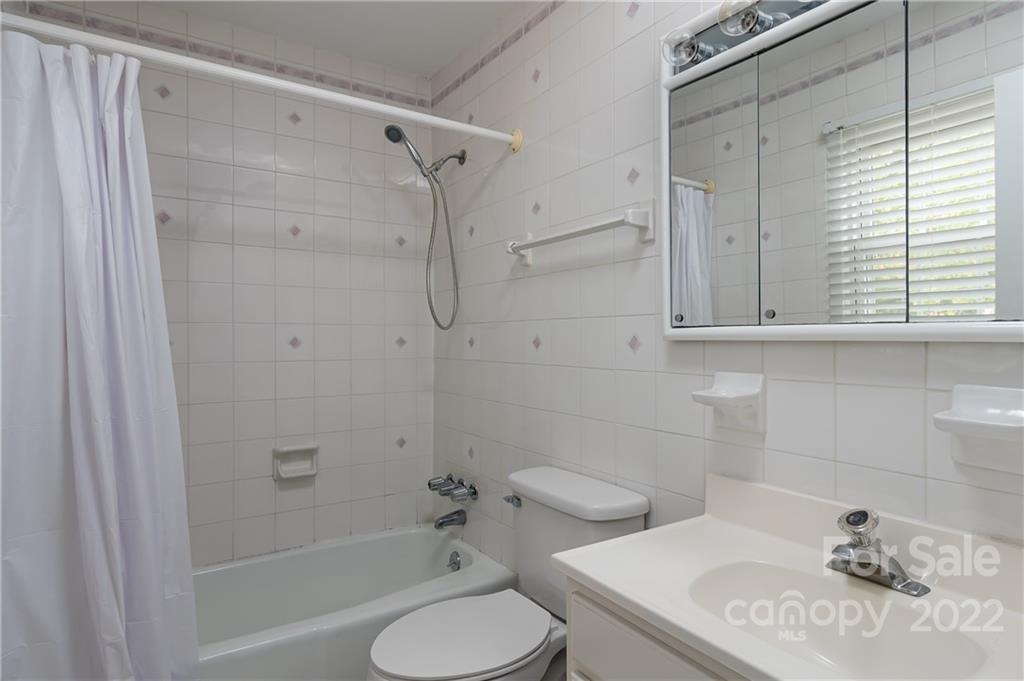 6777 Stoney Ridge Road Matthews, NC 28104 - Photo 23 of 27 a bathroom with a sink toilet and shower