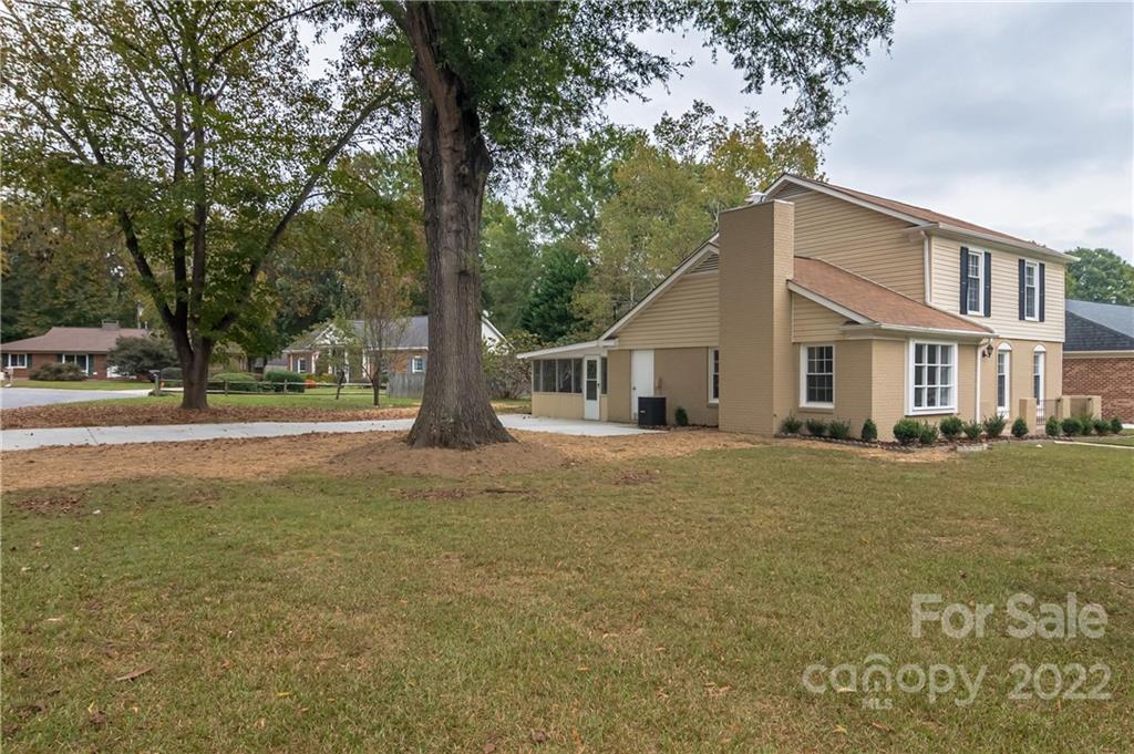 6777 Stoney Ridge Road Matthews, NC 28104 - Photo 26 of 27 a front view of a house with a yard