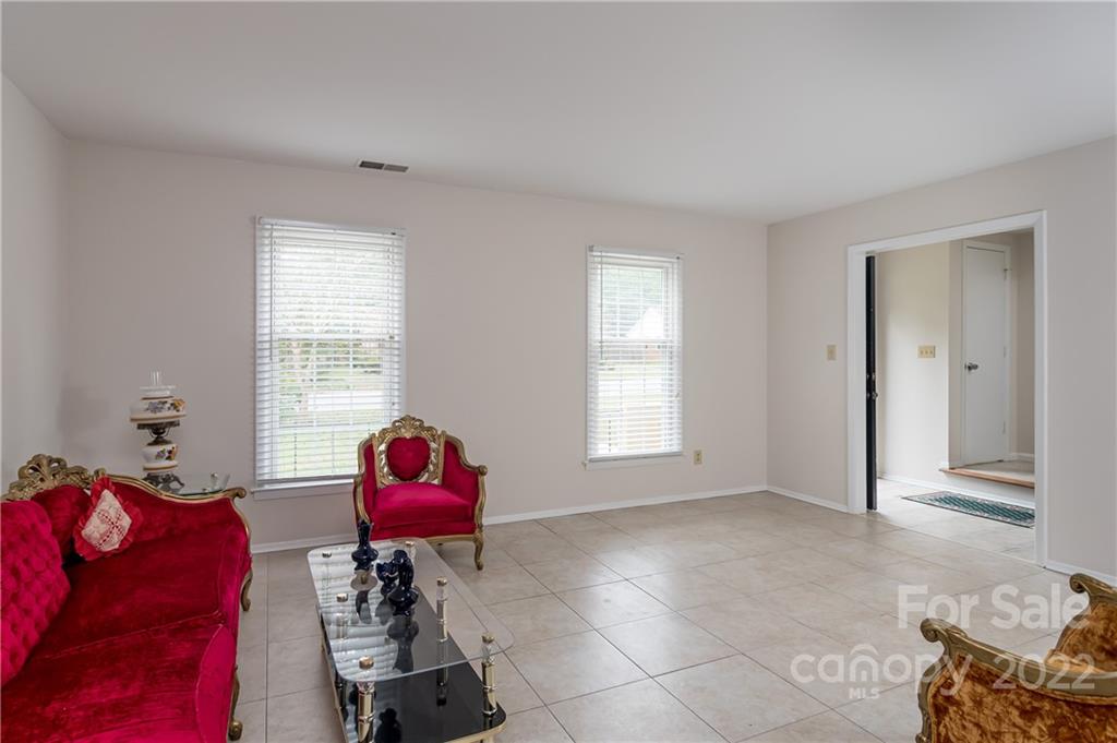 6777 Stoney Ridge Road Matthews, NC 28104 - Photo 5 of 27 a living room with furniture and a window