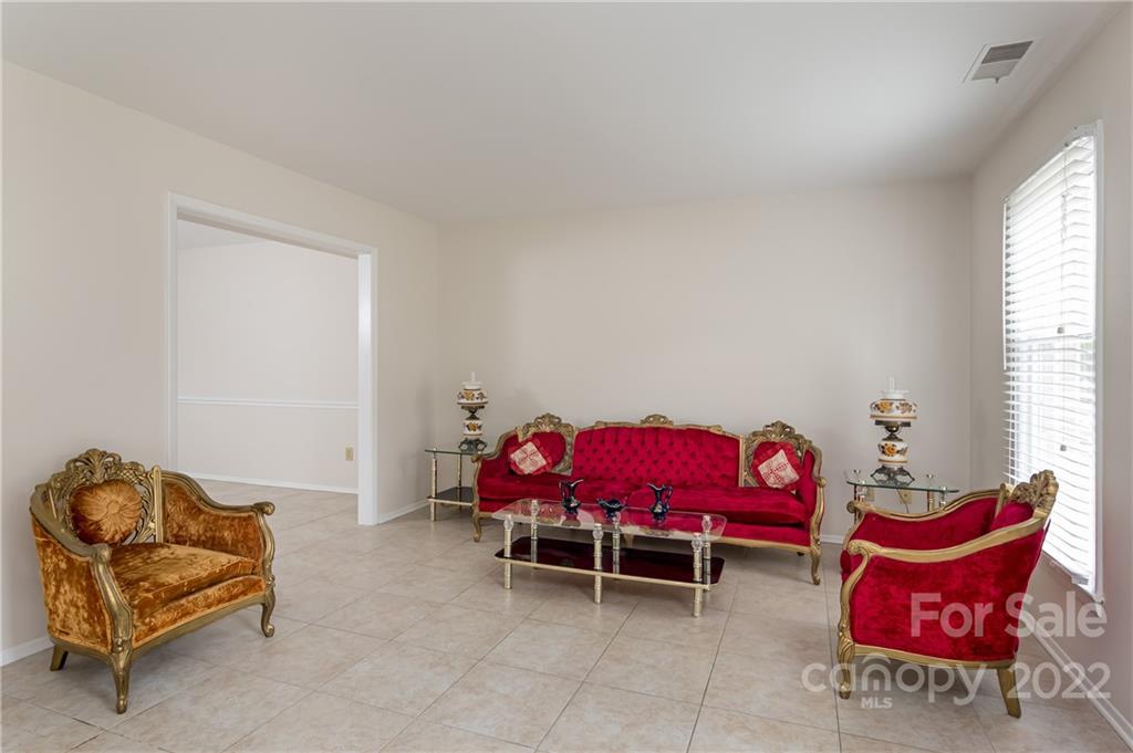 6777 Stoney Ridge Road Matthews, NC 28104 - Photo 6 of 27 a bedroom with furniture and a couch