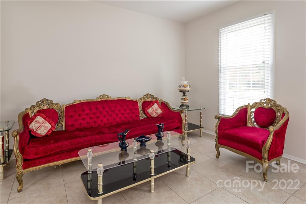 6777 Stoney Ridge Road Matthews, NC 28104 - Photo 7 of 27 a living room with furniture and a window
