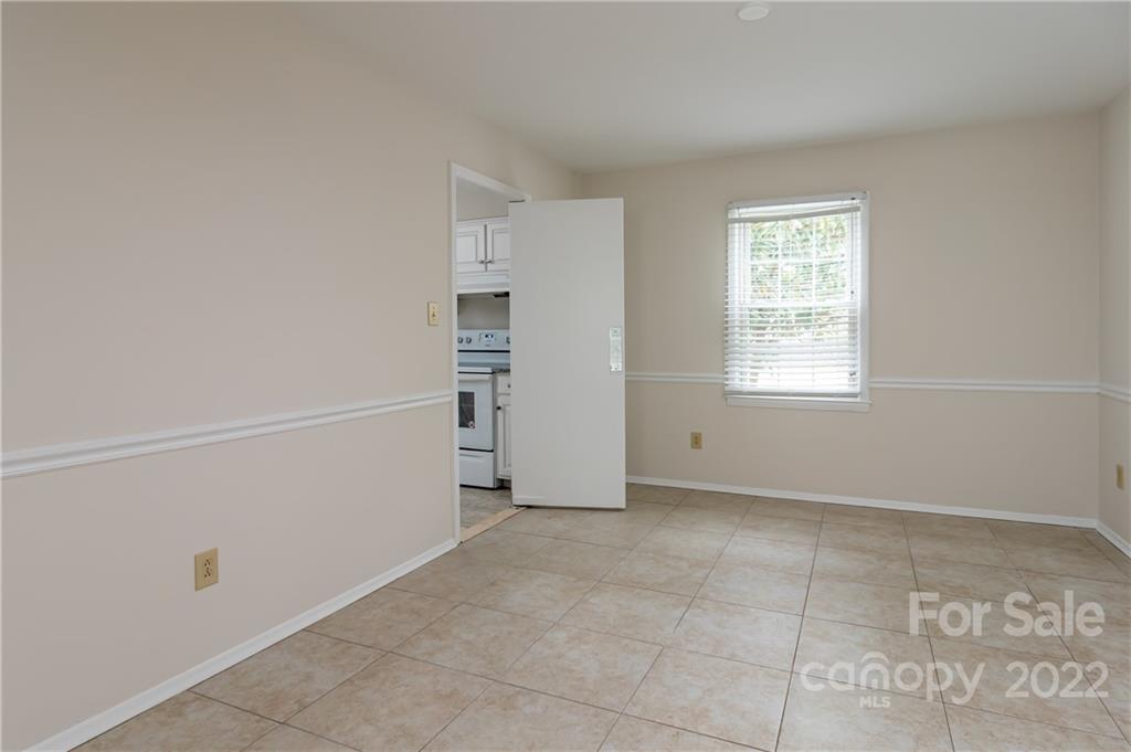 6777 Stoney Ridge Road Matthews, NC 28104 - Photo 8 of 27 an empty room with windows