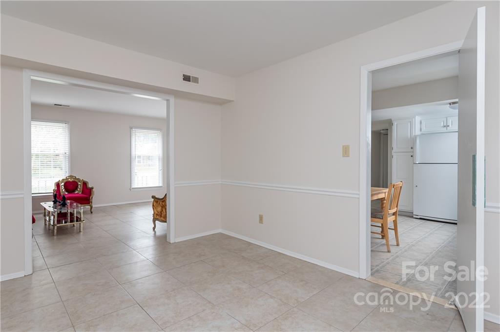 6777 Stoney Ridge Road Matthews, NC 28104 - Photo 9 of 27 a view of a livingroom with furniture and a window